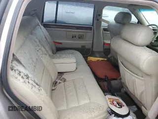 1995 Cadillac Concours z VIN 1G6KF52Y6SU244970, wystawiony jako Copart lot #75079524 z przebiegiem Nie podano mil oraz Szkody całkowita. Historia ofert i sprzedaży dostępna na DreamBid. Obrazek 10.