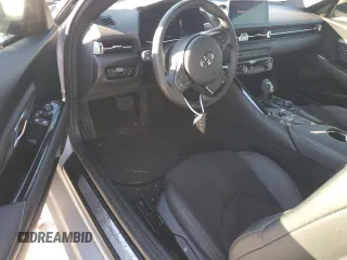 2022 Toyota GR Supra 2.0 with VIN WZ1DB2C08NW046734, listed as a Copart auction lot 83992154 with 43,576 mi miles and Salvage Title. Bid and sale history available at carsss.com. Image 8.