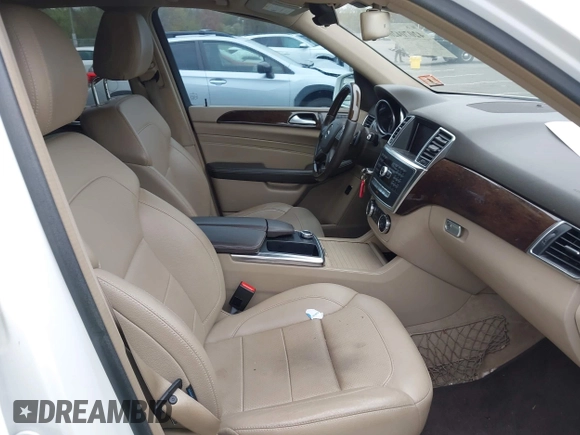 2014 Mercedes-Benz M 350 with VIN 4JGDA5JB2EA282733, listed as a IAAI auction lot 42070426 with 148,513 mi miles and . Bid and sale history available at DreamBid. Image 5.