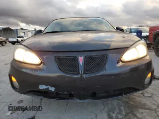 2007 Pontiac Grand Prix GT z VIN 2G2WR554471156148, wystawiony jako Copart lot #86649304 z przebiegiem 214 578 mil mil oraz Szkody całkowita. Historia ofert i sprzedaży dostępna na DreamBid. Obrazek 5.