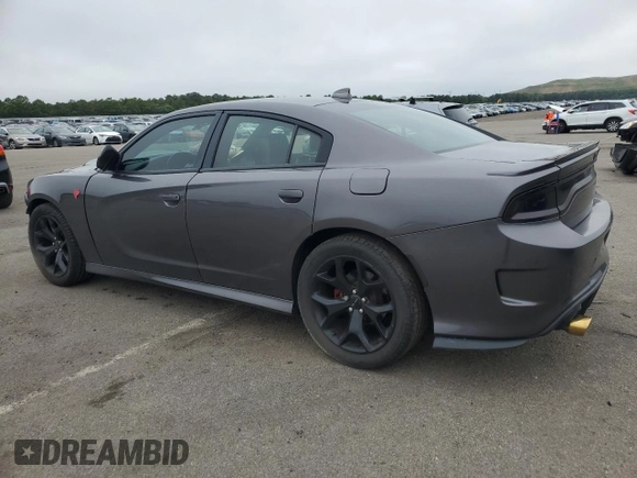 2016 Dodge Charger R/T with VIN 2C3CDXCT3GH298103, listed as a Copart auction lot 61351185 with 61,648 mi miles and Salvage title. Bid and sale history available at DreamBid. Image 2.