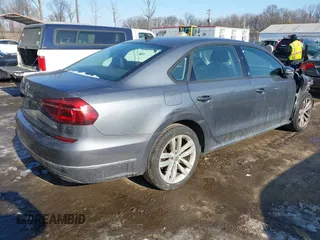 2019 Volkswagen Passat 2.0T Wolfsburg Edition with VIN 1VWLA7A37KC012589, listed as a IAAI auction lot 41394161 with 97,652 mi miles. Bid and sale history available at carsss.com. Image 4.