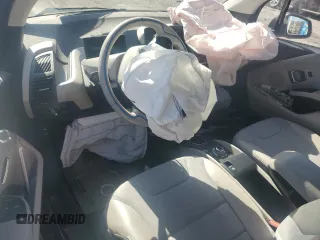 2015 BMW i3 z VIN WBY1Z4C51FV502745, wystawiony jako Copart lot #51739575 z przebiegiem Nie podano mil oraz Szkoda całkowita • Salvage title. Historia ofert i sprzedaży dostępna na DreamBid. Obrazek 8.