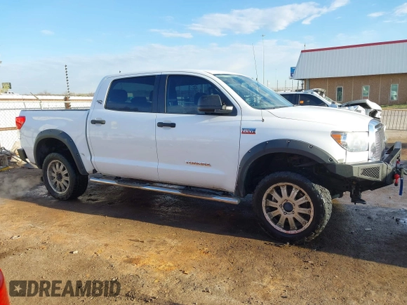 2012 Toyota Tundra 4WD Truck with VIN 5TFDW5F10CX241968, listed as a IAAI auction lot 41858300 with 272,634 mi miles. Bid and sale history available at carsss.com. Image 13.