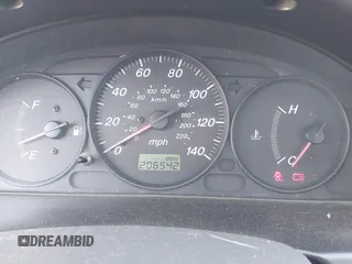 2000 Mazda Protege DX with VIN JM1BJ2227Y0303448, listed as a IAAI auction lot 41482747 with 206,542 mi miles and . Bid and sale history available at DreamBid. Image 7.