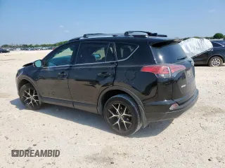 2018 Toyota RAV4 SE with VIN 2T3NFREV6JW436488, listed as a Copart auction lot 60297905 with 74,034 mi miles and Salvage title. Bid and sale history available at DreamBid. Image 2.