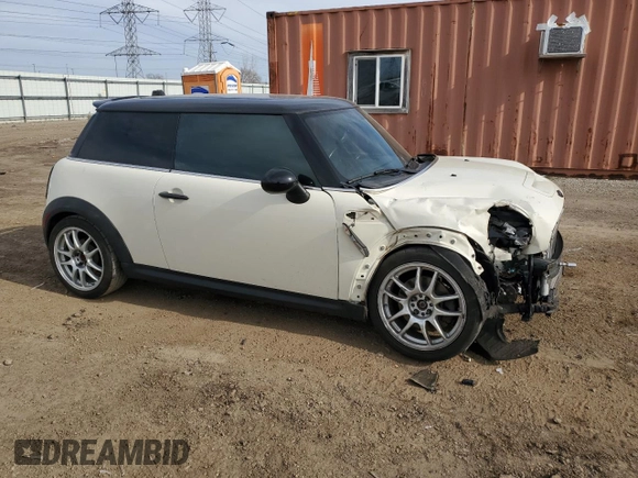 2013 MINI Hardtop S with VIN WMWSV3C54DT478670, listed as a Copart auction lot 52710445 with 58,974 mi miles and Salvage title. Bid and sale history available at DreamBid. Image 4.