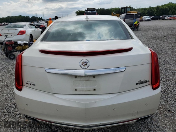 2013 Cadillac XTS Luxury with VIN 2G61P5S33D9125769, listed as a Copart auction lot 59671015 with 143,583 mi miles and Salvage title. Bid and sale history available at DreamBid. Image 6.