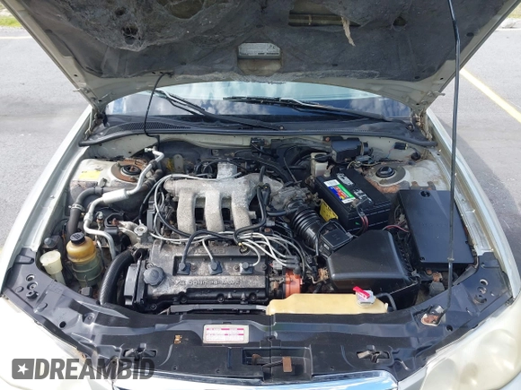2002 Mazda Millenia with VIN JM1TA221721722364, listed as a IAAI auction lot 42160683 with 166,778 mi miles and . Bid and sale history available at DreamBid. Image 10.