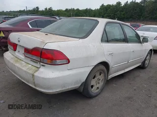 2001 Honda Accord EX z VIN 1HGCG16591A053150, wystawiony jako IAAI lot #42365043 z przebiegiem 263 431 mil mil oraz . Historia ofert i sprzedaży dostępna na DreamBid. Obrazek 4.