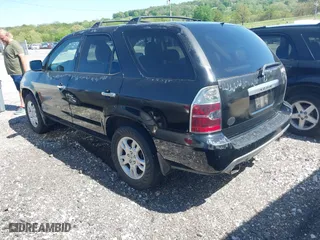 2005 Acura MDX Touring with VIN 2HNYD18645H543726, listed as a IAAI auction lot 42094485 with 242,073 mi miles. Bid and sale history available at carsss.com. Image 3.