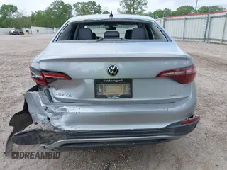2024 Volkswagen Jetta SE z VIN 3VW7M7BU9RM012652, wystawiony jako IAAI lot #41911472 z przebiegiem 47 151 mil mil oraz . Historia ofert i sprzedaży dostępna na DreamBid. Obrazek 16.