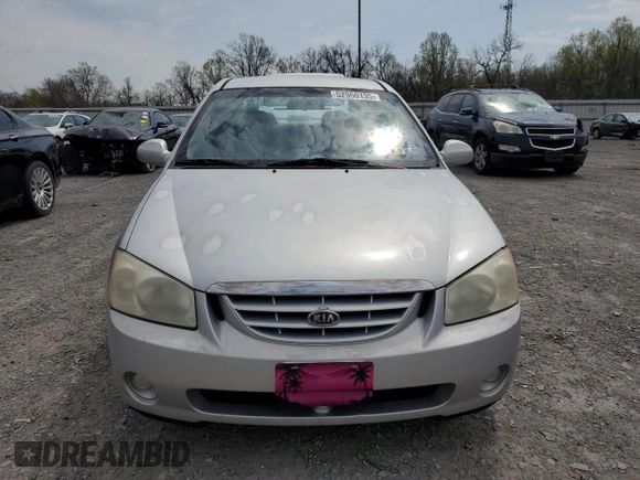 2004 Kia Spectra LX with VIN KNAFE121245031019, listed as a Copart auction lot 52960135 with 183,016 mi miles and Salvage Title. Bid and sale history available at carsss.com. Image 5.