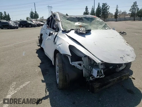 2023 Tesla Model Y Long Range z VIN 7SAYGDEE3PA077841, wystawiony jako Copart lot #54535215 z przebiegiem Nie podano mil oraz Szkoda całkowita • Salvage title. Historia ofert i sprzedaży dostępna na DreamBid. Obrazek 13.