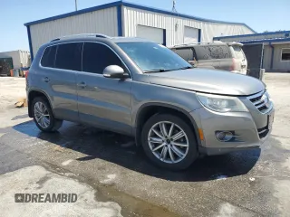 2011 Volkswagen Tiguan SE with VIN WVGBV7AX2BW561987, listed as a Copart auction lot 55385195 with 146,907 mi miles and Salvage Title. Bid and sale history available at DreamBid. Image 4.