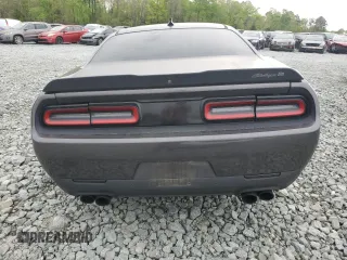 2018 Dodge Challenger T/A with VIN 2C3CDZBT2JH219413, listed as a Copart auction lot 53278745 with 133,257 mi miles and Salvage title. Bid and sale history available at DreamBid. Image 6.