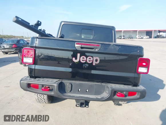 2023 Jeep Gladiator Rubicon z VIN 1C6JJTBGXPL543787, wystawiony jako IAAI lot #40963799 z przebiegiem 5 402 mil mil oraz . Historia ofert i sprzedaży dostępna na DreamBid. Obrazek 17.