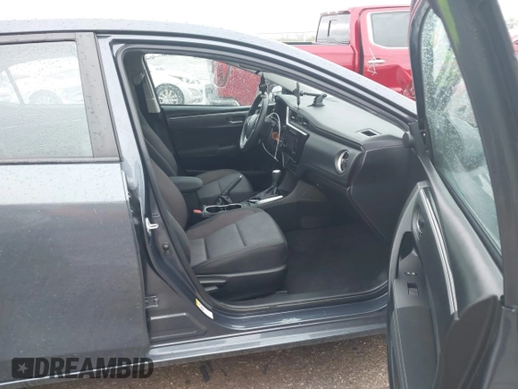 2019 Toyota Corolla L with VIN 5YFBURHE8KP873067, listed as a IAAI auction lot 41936471 with 75,076 mi miles and . Bid and sale history available at carsss.com. Image 5.