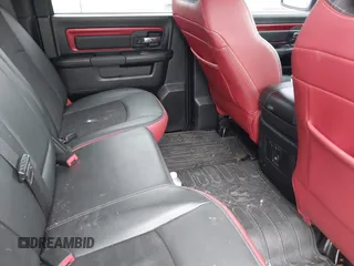2016 Ram 1500 Rebel z VIN 1C6RR7YT0GS100285, wystawiony jako IAAI lot #42346719 z przebiegiem 103 309 mil mil oraz . Historia ofert i sprzedaży dostępna na DreamBid. Obrazek 8.