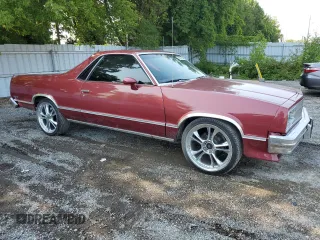 1984 GMC Caballero z VIN 1GTCW80HXER501304, wystawiony jako Copart lot #68697714 z przebiegiem 436 532 mil mil oraz Tytuł czysty. Historia ofert i sprzedaży dostępna na DreamBid. Obrazek 4.