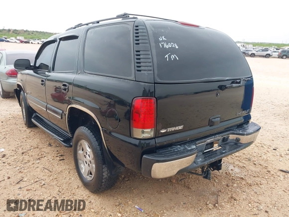 2002 Chevrolet Tahoe LT with VIN 1GNEC13Z72R176028, listed as a IAAI auction lot 41897050 with 216,553 mi miles. Bid and sale history available at carsss.com. Image 3.