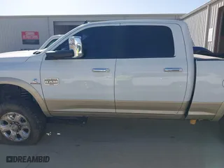 2014 Ram 2500 Longhorn with VIN 3C6UR5GLXEG244401, listed as a IAAI auction lot 41779709 with 180,760 mi miles. Bid and sale history available at carsss.com. Image 14.