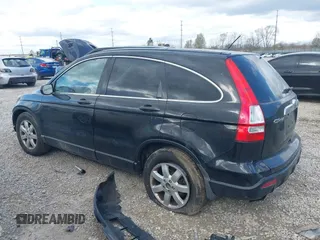 2009 Honda CR-V EX with VIN 3CZRE48559G703595, listed as a IAAI auction lot 42023697 with 250,225 mi miles. Bid and sale history available at carsss.com. Image 14.