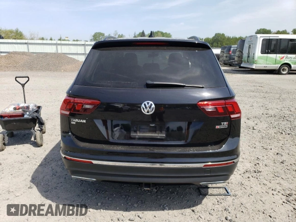 2018 Volkswagen Tiguan SEL z VIN 3VV2B7AX7JM119297, wystawiony jako Copart lot #54416195 z przebiegiem 51 972 mil mil oraz Szkoda całkowita • Salvage title. Historia ofert i sprzedaży dostępna na DreamBid. Obrazek 6.