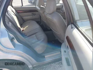 2005 Mercury Grand Marquis LS Premium z VIN 2MEFM75W15X621971, wystawiony jako IAAI lot #42130811 z przebiegiem 129 700 mil mil oraz . Historia ofert i sprzedaży dostępna na DreamBid. Obrazek 8.
