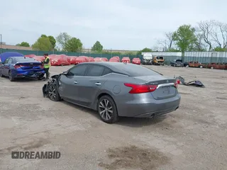 2018 Nissan Maxima SV with VIN 1N4AA6AP4JC377985, listed as a IAAI auction lot 42071678 with 104,326 mi miles and . Bid and sale history available at DreamBid. Image 3.