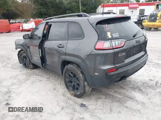 2022 Jeep Cherokee X with VIN 1C4PJMCX0ND538919, listed as a IAAI auction lot 41321416 with 65,577 mi miles. Bid and sale history available at carsss.com. Image 3.