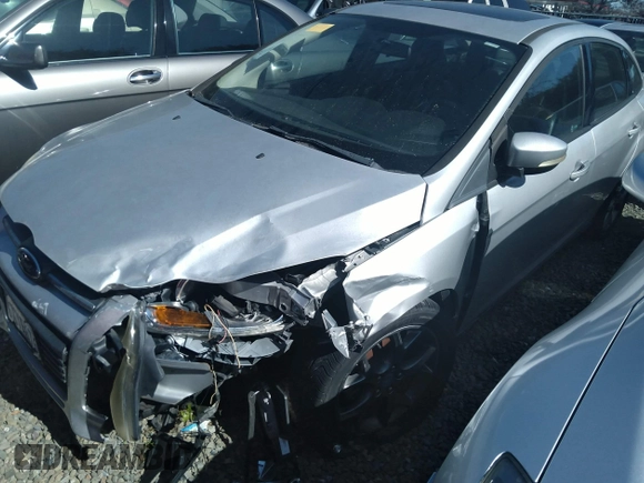 2013 Ford Focus SE with VIN 1FADP3F26DL235990, listed as a IAAI auction lot 41759160 with 120,715 mi miles. Bid and sale history available at carsss.com. Image 2.