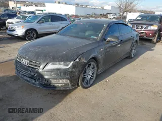 2014 Audi A7 3.0 Prestige with VIN WAU2GAFC6EN030266, listed as a IAAI auction lot 41439486 with 160,917 mi miles. Bid and sale history available at carsss.com. Image 18.