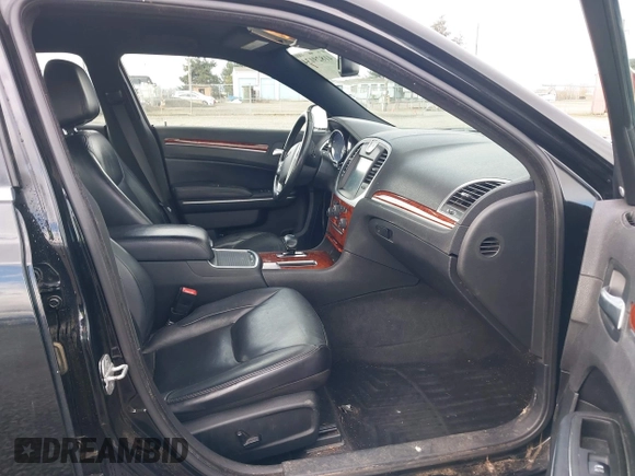 2012 Chrysler 300 Limited with VIN 2C3CCACG0CH263449, listed as a IAAI auction lot 41829134 with 157,108 mi miles. Bid and sale history available at carsss.com. Image 5.
