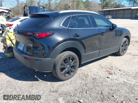 2022 Mazda CX-30 2.5 Turbo Premium Package with VIN 3MVDMBDY4NM446866, listed as a IAAI auction lot 41704578 with 24,360 mi miles. Bid and sale history available at carsss.com. Image 4.
