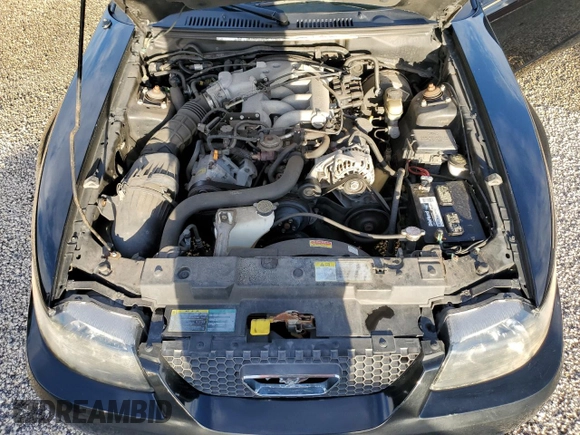 2004 Ford Mustang Deluxe with VIN 1FAFP44414F125267, listed as a Copart auction lot 74595714 with 0 mi miles and Salvage Title. Bid and sale history available at carsss.com. Image 11.