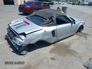 2000 Toyota MR2 z VIN JTDFR3207Y0019297, wystawiony jako IAAI lot #42363059 z przebiegiem 80 260 mil mil oraz . Historia ofert i sprzedaży dostępna na DreamBid. Obrazek 4.