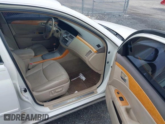 2007 Toyota Avalon XL with VIN 4T1BK36B17U199524, listed as a IAAI auction lot 42005419 with 237,086 mi miles and . Bid and sale history available at carsss.com. Image 5.