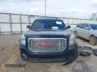 2015 GMC Yukon Denali with VIN 1GKS1CKJ8FR612971, listed as a IAAI auction lot 41519689 with 197,003 mi miles. Bid and sale history available at carsss.com. Image 12.