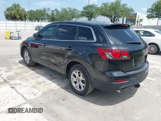 2014 Mazda CX-9 Touring with VIN JM3TB2CA5E0429835, listed as a IAAI auction lot 42439258 with 110,914 mi miles and . Bid and sale history available at DreamBid. Image 3.