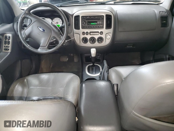 2006 Ford Escape XLT with VIN 1FMCU03106KC14923, listed as a Copart auction lot 52727095 with 126,842 mi miles and Salvage Title. Bid and sale history available at DreamBid. Image 8.