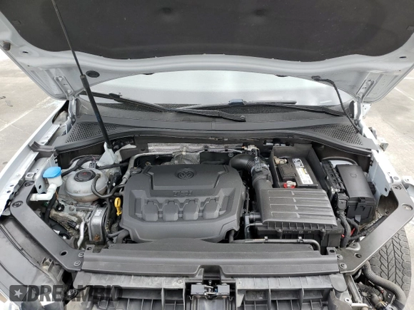 2018 Volkswagen Tiguan S with VIN 3VV1B7AXXJM013468, listed as a Copart auction lot 58371875 with 61,464 mi miles and Salvage title. Bid and sale history available at DreamBid. Image 12.