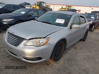 2012 Chrysler 200 LX with VIN 1C3CCBAB4CN100534, listed as a IAAI auction lot 41717885 with 217,921 mi miles. Bid and sale history available at carsss.com. Image 2.