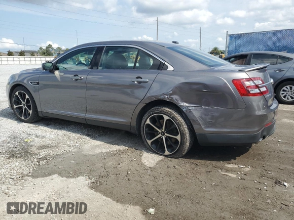 2014 Ford Taurus SHO with VIN 1FAHP2KT2EG152366, listed as a Copart auction lot 56479525 with 82,639 mi miles and Salvage title. Bid and sale history available at DreamBid. Image 2.