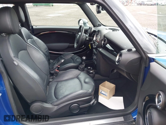 2012 MINI Hardtop S with VIN WMWSV3C53CTY26652, listed as a IAAI auction lot 42132011 with 65,856 mi miles and . Bid and sale history available at DreamBid. Image 5.
