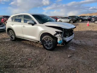 2021 Mazda CX-5 Touring with VIN JM3KFBCM0M0355894, listed as a Copart auction lot 83593464 with 80,703 mi miles and Salvage Title. Bid and sale history available at carsss.com. Image 14.