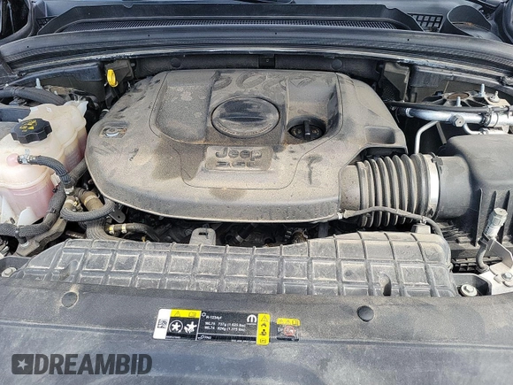 2021 Jeep Grand Cherokee Overland with VIN 1C4RJKDG7M8182214, listed as a IAAI auction lot 42796118 with 69,689 mi miles and . Bid and sale history available at DreamBid. Image 14.