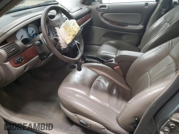 2002 Chrysler Sebring Touring with VIN 1C3AL56R32N270378, listed as a Copart auction lot 50868935 with 26,099 mi miles and Salvage title. Bid and sale history available at DreamBid. Image 7.