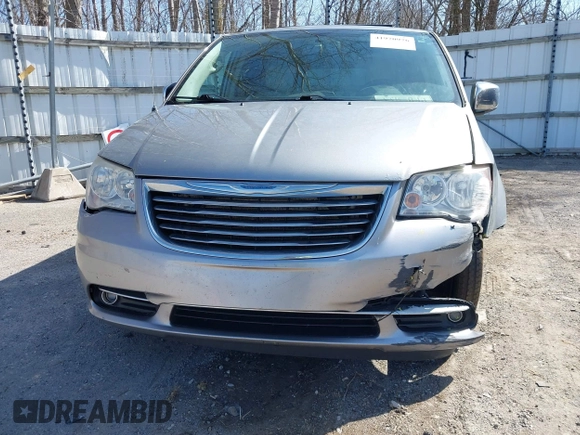 2013 Chrysler Town & Country Touring L with VIN 2C4RC1CG6DR660858, listed as a IAAI auction lot 41970976 with 140,299 mi miles and . Bid and sale history available at DreamBid. Image 17.