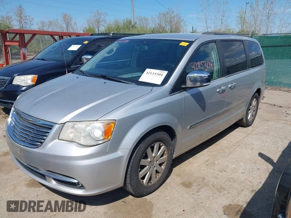 2011 Chrysler Town & Country Touring L with VIN 2A4RR8DG8BR797653, listed as a IAAI auction lot 42115304 with 185,613 mi miles and . Bid and sale history available at DreamBid. Image 2.